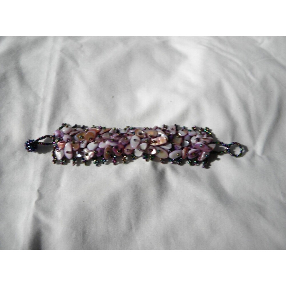 Shell and Seed Bead Bracelet hand made in purple, white, pink, blue and green